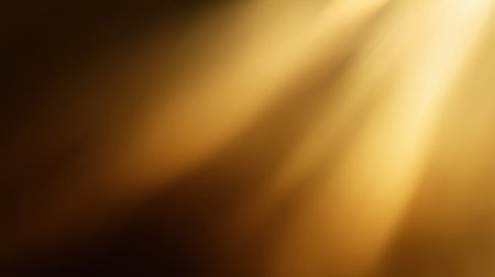This stunning abstract image showcases soft light rays in golden hues, perfect for artistic projects, backgrounds, and design elements that inspire warmth and elegance.の素材