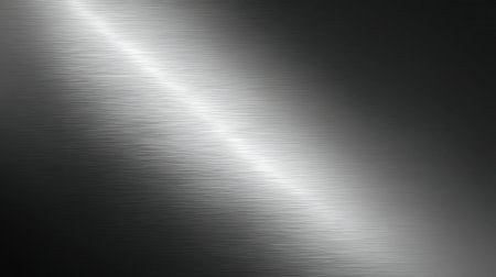 This image showcases a smooth metallic surface with a subtle gradient, perfect for use in backgrounds, textures, and modern design projects across various contexts.の素材