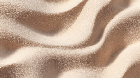 Soft, wave-like patterns of desert sand create a tranquil and harmonious visual experience. The subtle texture and warm tones evoke a sense of calm and beauty.の素材