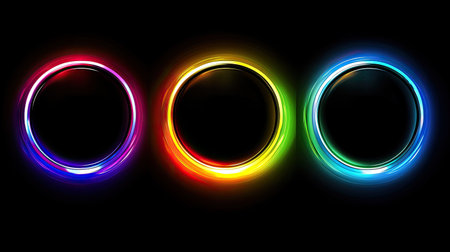 Dynamic neon circles glowing in gradient colors, floating on a dark gradient background.の素材