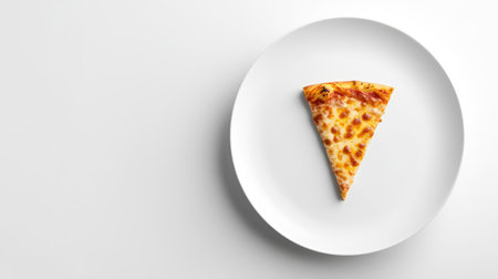 A minimalist view of a cheese-loaded slice of pizza on a clean white plate, empty background for text.の素材