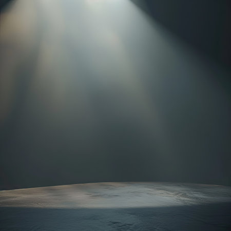 empty studio with a smooth abstract background and a single spotlight effect illuminating the spaceの素材