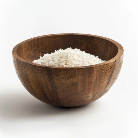 Rustic wooden bowl with a serving of rice, isolated on a pristine white backdropの素材