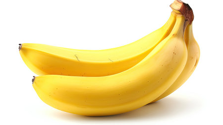 Fresh yellow banana against a plain white background, ideal for healthy eating and nutrition concepts.の素材