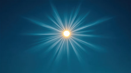 Captivating image of a bright sun surrounded by radiating rays against a serene blue sky, perfect for representing warmth and energy of beautiful sunny days.の素材