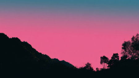This stunning mountainscape features a vibrant pink sky at dusk, accented by silhouetted trees against the serene backdrop, perfect for nature-themed projects.の素材