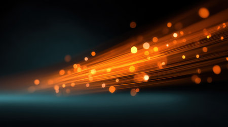 A captivating abstract background featuring glowing orange lights and sleek streaks of motion, creating an energetic and dynamic atmosphere ideal for various creative projects.の素材