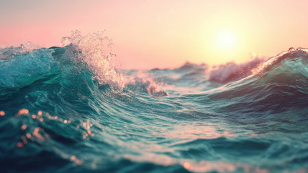 This image captures the beauty of ocean waves illuminated by a soft sunset light, creating a tranquil and serene atmosphere perfect for beach and nature themes.の素材