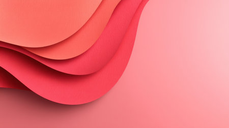 This image showcases an abstract composition of layered paper in coral and peach hues, ideal for design projects, backgrounds, and creative endeavors.の素材