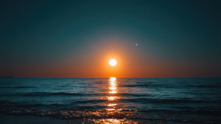 A breathtaking view of a sunset casting vibrant colors over the calm ocean, creating a serene atmosphere. Celestial bodies add to the enchanting twilight scene.の素材