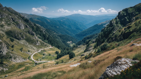 Captivating view of a picturesque mountain valley showcases rolling hills, lush greenery, and a serene sky, perfect for travel and nature enthusiasts.の素材