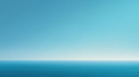 Experience the tranquility of a serene blue ocean horizon captured in this image. Perfect for backgrounds, this visual evokes peace and relaxation, ideal for any project.の素材