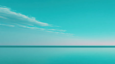 A tranquil seascape showcases a calm turquoise ocean and a delicate layer of clouds, perfect for conveying peace and serenity in various creative projects.の素材