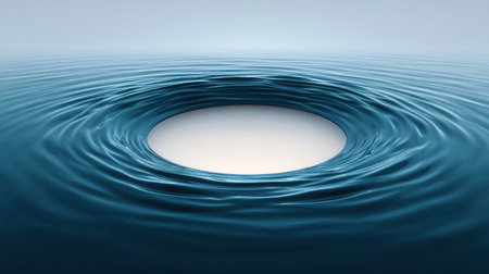 A captivating image of circular ripples forming on a calm water surface, creating a serene and tranquil atmosphere ideal for relaxation and peaceful themes.の素材