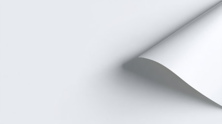 A close-up view of white curled paper creates a soft, elegant look with gentle shadows on a light background, perfect for creative design and artistic presentations.の素材