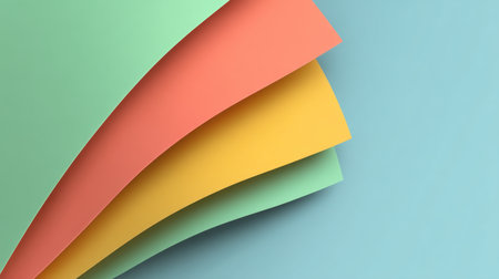A visually appealing arrangement of colorful paper sheets in green, orange, and yellow neatly layered on a soothing blue background, perfect for creative projects.の素材
