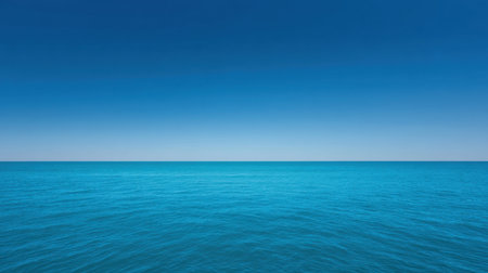 Explore a beautiful ocean view featuring calm waters and a clear blue sky, ideal for evoking feelings of peace, tranquility, and natural beauty in any setting.の素材