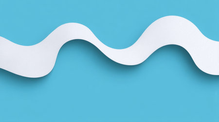 A beautifully curved white ribbon flows over a striking blue backdrop, creating a modern visual that evokes creativity and elegance, perfect for design projects.の素材