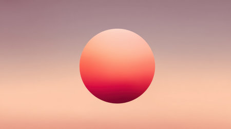 An elegant image featuring a round orange sun set against a soft gradient sky in shades of pink and peach. Ideal for creating a serene and calming atmosphere in various design projects.の素材