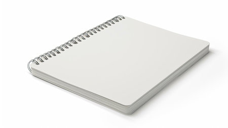 Realistic closed blank spiral notepad, isolated on white backgroundの素材