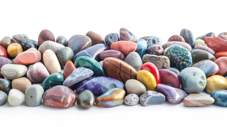 Variety of colorful stones displayed in a neat arrangement, white backgroundの素材