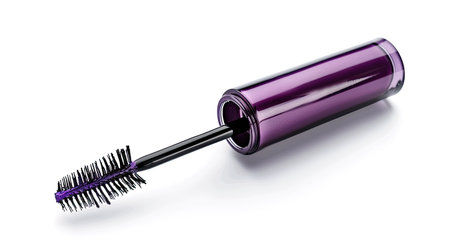 Stylish open purple mascara tube, brush and tube, isolated on white background, makeup itemの素材