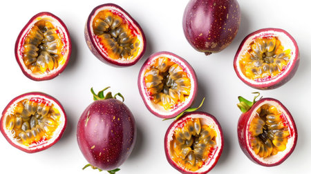 Whole passion fruits and cut halves, highlighting juicy interiors, arranged on a white backgroundの素材