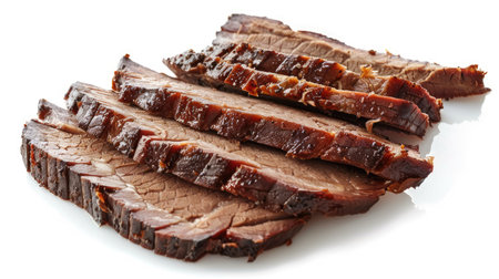 Mouthwatering slices of smoked pork brisket, isolated on whiteの素材