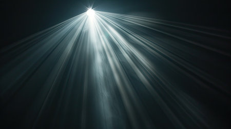 Radiant light beam shining through the blackness, close-up viewの素材