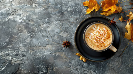 Pumpkin latte with spice on a stone background, autumn concept, hot drink with clear copy spaceの素材