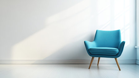 A single, bright blue chair in a minimalist room with a plain white wallの素材