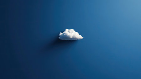 Bright indigo background with a single white cloud cutout, centered and softly shadowedの素材