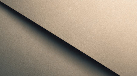 This image showcases a minimalist design featuring a close-up of textured paper with a diagonal line, illuminated softly to create gentle shadows and neutral tones.の素材