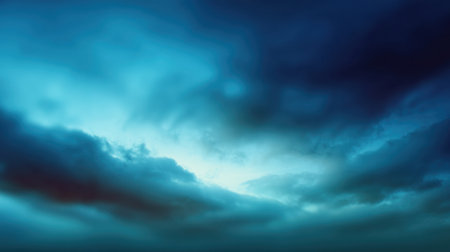 This captivating image features an expansive sky filled with serene clouds in varying shades of blue and gray, evoking a peaceful and atmospheric feel, perfect for backgrounds.の素材