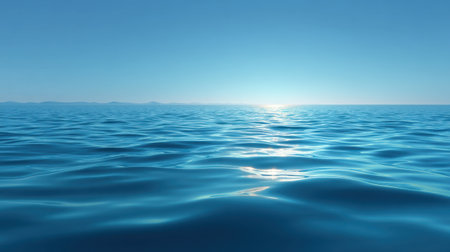 Captivating view of serene ocean surface showcasing gentle waves reflecting sunlight. Perfect for themes of tranquility, relaxation, and natural beauty in coastal environments.の素材