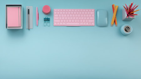 A beautifully arranged office desk featuring pastel colors, modern stationery, and stylish accessories perfect for enhancing creativity and productivity in a workspace setting.の素材