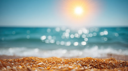 A serene beach scene capturing golden sand and gentle waves under a bright sun. Perfect for evoking a sense of peace, relaxation, and natural beauty.の素材