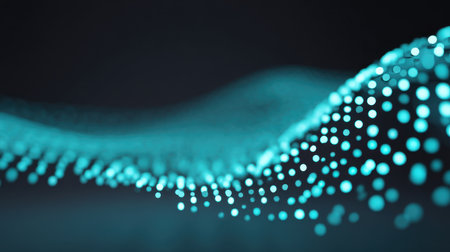 This abstract image features a stunning display of glowing blue dots arranged in a dynamic wave pattern, symbolizing technology and innovation in a vivid and artistic manner.の素材