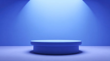 A sleek blue circular podium bathed in soft lighting creates a stylish ambiance. Ideal for presentations, artistic displays, or decorative showcases.の素材