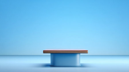 A clean and modern display pedestal equipped with a smooth surface in a light blue setting, perfect for showcasing products or artistic displays in various settings.の素材