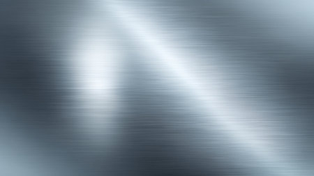This abstract image showcases a shiny silver metal texture with a smooth gradient and soft light reflections, perfect for backgrounds and graphic design projects.の素材