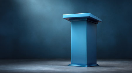 A sleek blue podium stands alone in a dimly lit studio, surrounded by a soft haze. This image captures the essence of public speaking and professional presentations.の素材