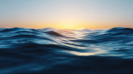 A stunning view of gentle ocean waves at sunset, capturing the beauty of soft light reflecting on the water surface and creating a tranquil atmosphere.の素材
