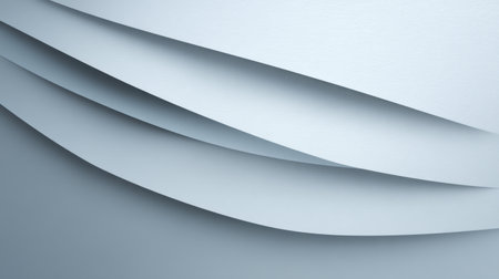 This image features abstract layers of soft blue paper, creating an elegant design suitable for backgrounds, presentations, and artistic projects emphasizing minimalism.の素材