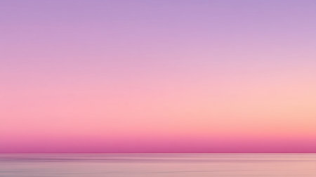 A tranquil sunset scene showcasing soft purple and pink tones over calm ocean waters, perfect for evoking serenity and relaxation in nature-focused projects.の素材