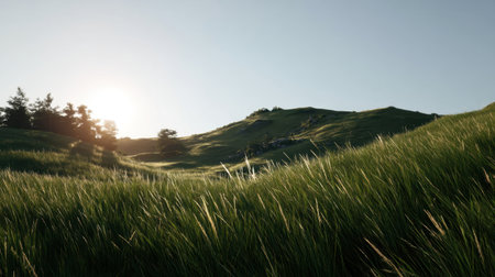 A picturesque landscape showcasing rolling hills adorned with lush green grass as the sun rises, creating a peaceful and serene atmosphere for nature lovers.の素材