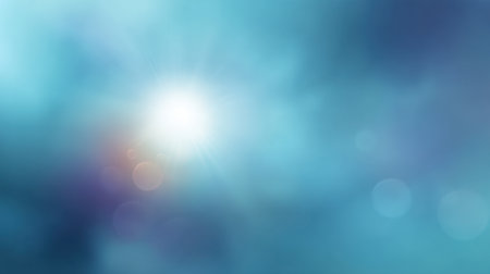 This soft blue background features a glowing light at the center, complemented by a dreamy bokeh effect. Ideal for creative projects needing tranquility and beauty.の素材