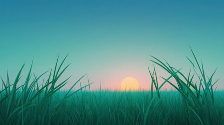 Experience the beauty of a tranquil sunrise casting gentle light over lush green grass. This serene landscape invites peace and calm in nature's embrace.の素材