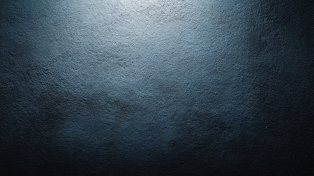 A dark textured surface featuring subtle highlights, perfect for use as a background or canvas in creative and graphic design projects, adding depth and style.の素材
