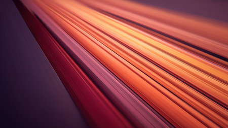 A captivating abstract image featuring dynamic lines in warm tones of orange, red, and purple, conveying movement and energy against a smooth backdrop.の素材